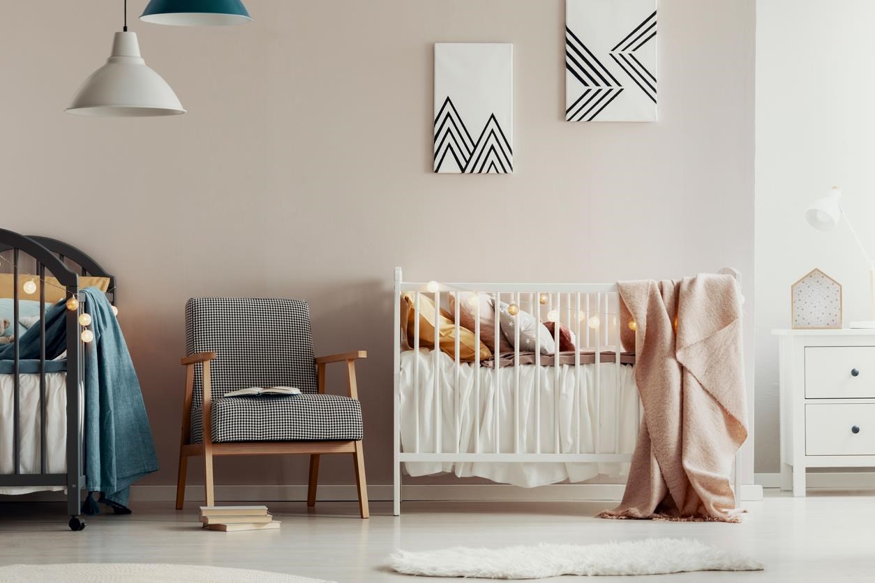 A neutral-colored baby nursery. 