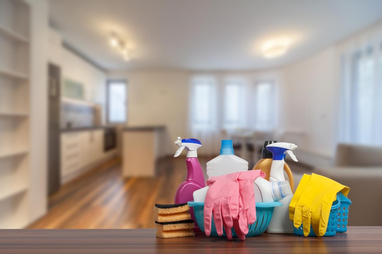 Cleaning supplies sitting on a table. 