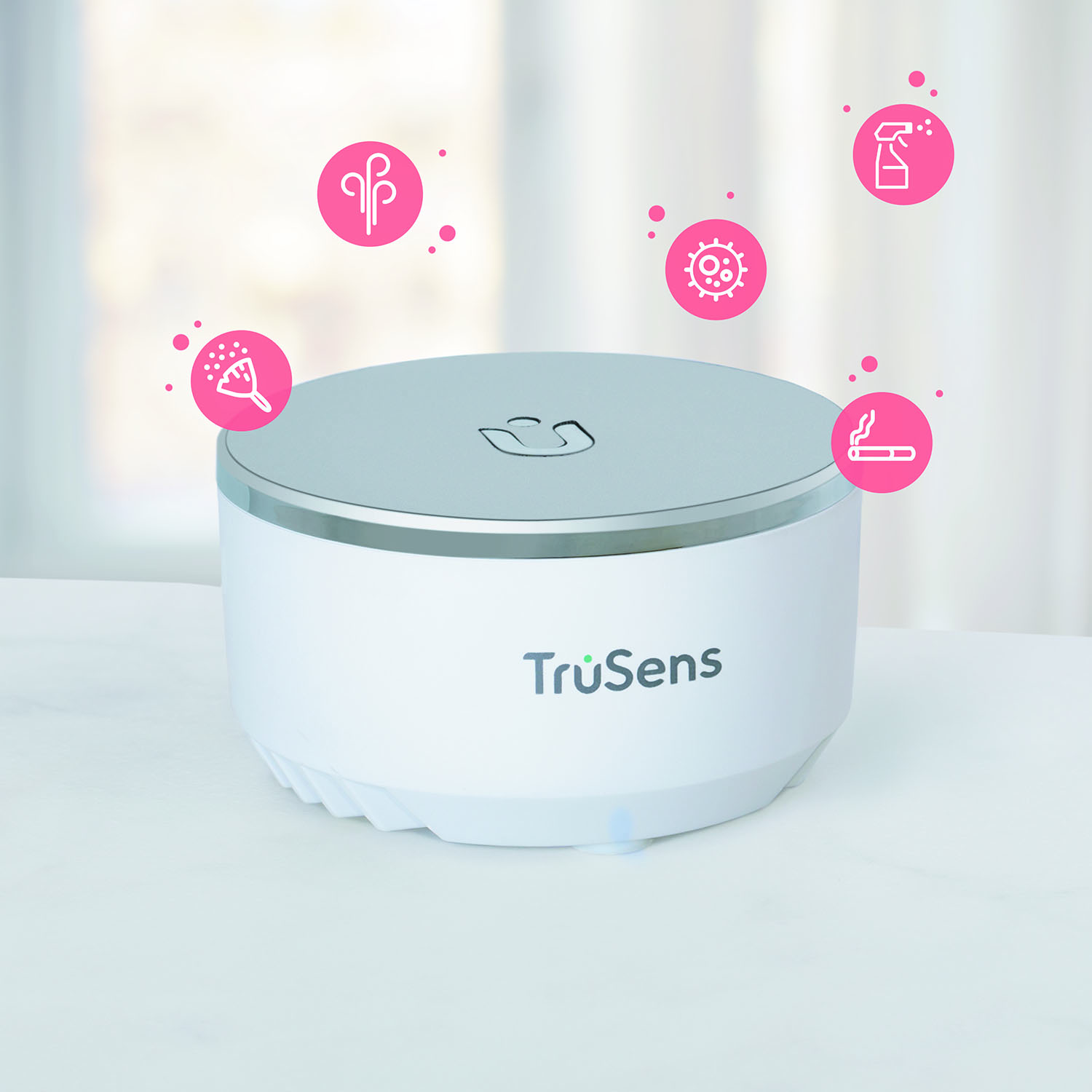 TruSens enhanced SensorPod with air pollutant particle icons surrounding it in the air.
