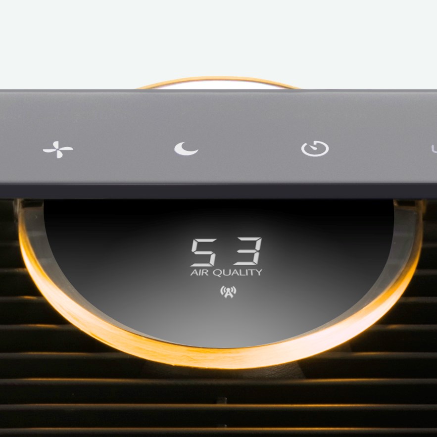 Close up of the front of a TruSens Air Purifier, its air quality display on 