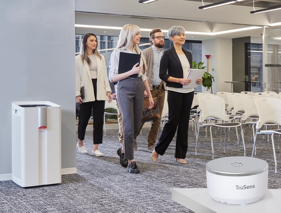 TruSens performance air purifier in an office with remote sensorpod on counter across the room
